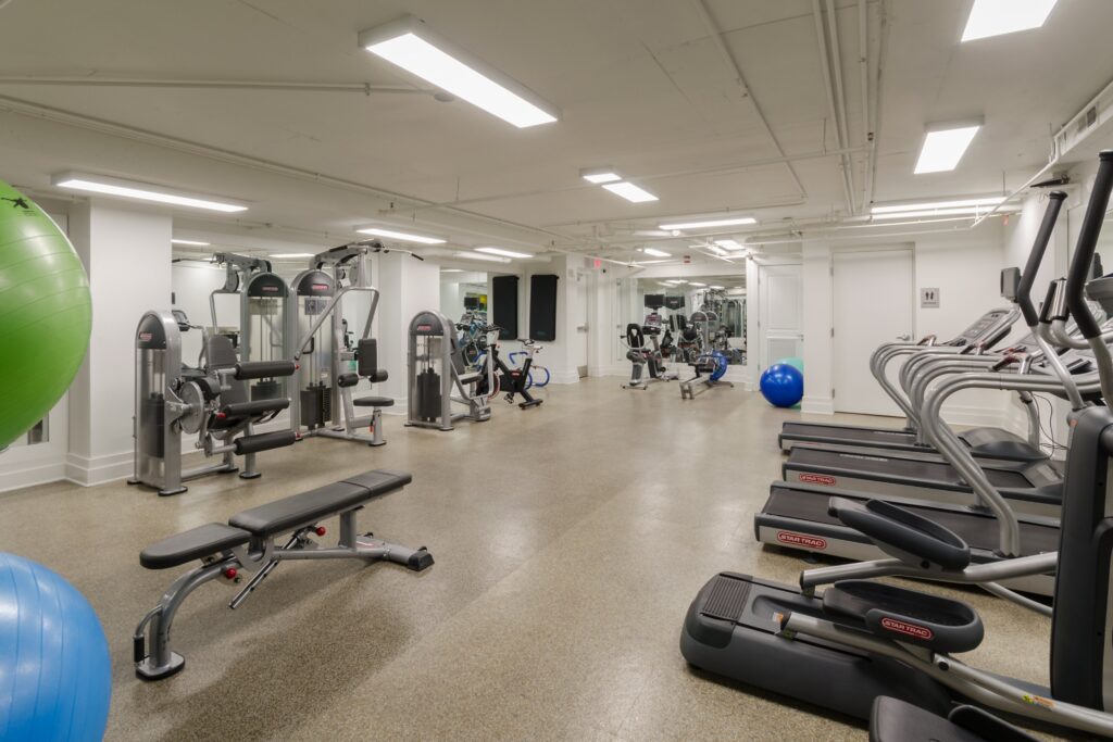 Fitness center with cardio and strength training equipment