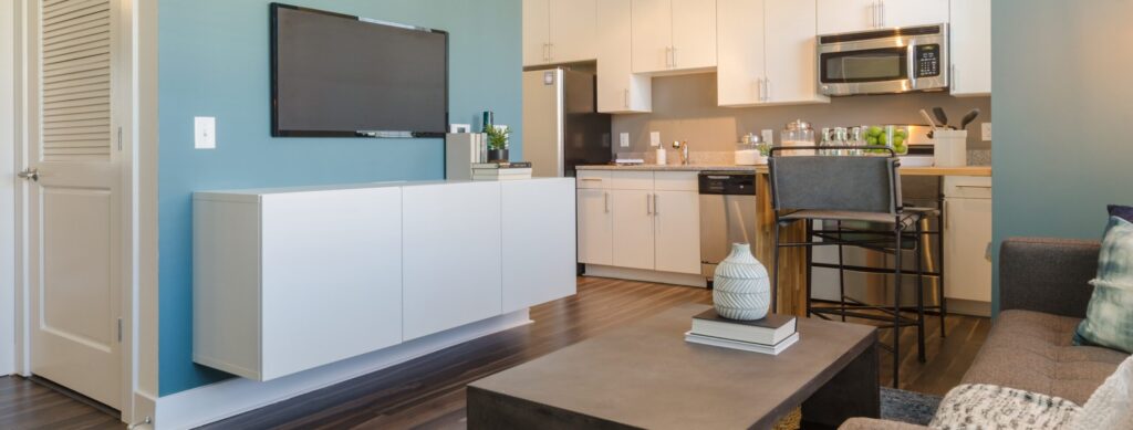 Living room with view into the open kitchen